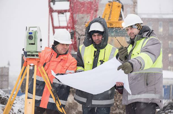 outdoor laborers working in wintery conditions